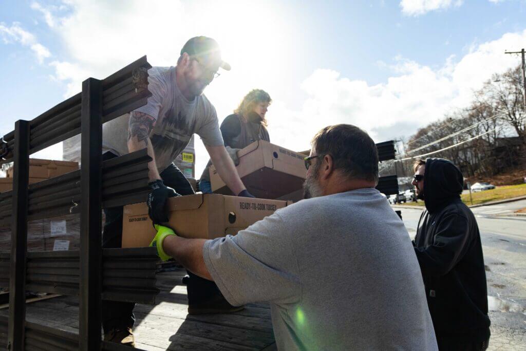 BIW employees give Bath Area Food Bank turkeys