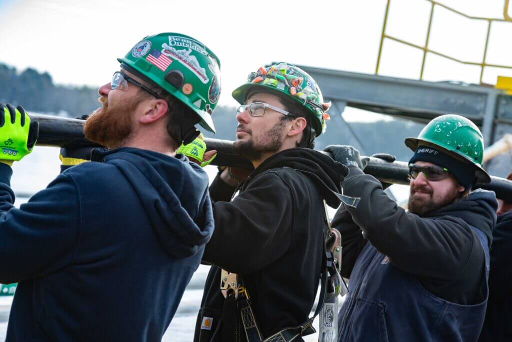 Electricians at BIW pull cable