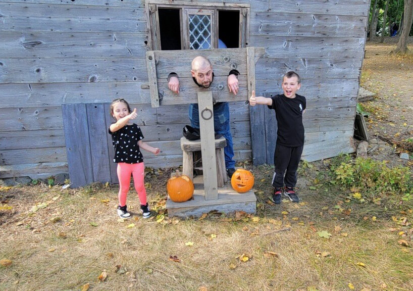 Family of three enjoys the BIW Employee Spirit Team trip to Salem